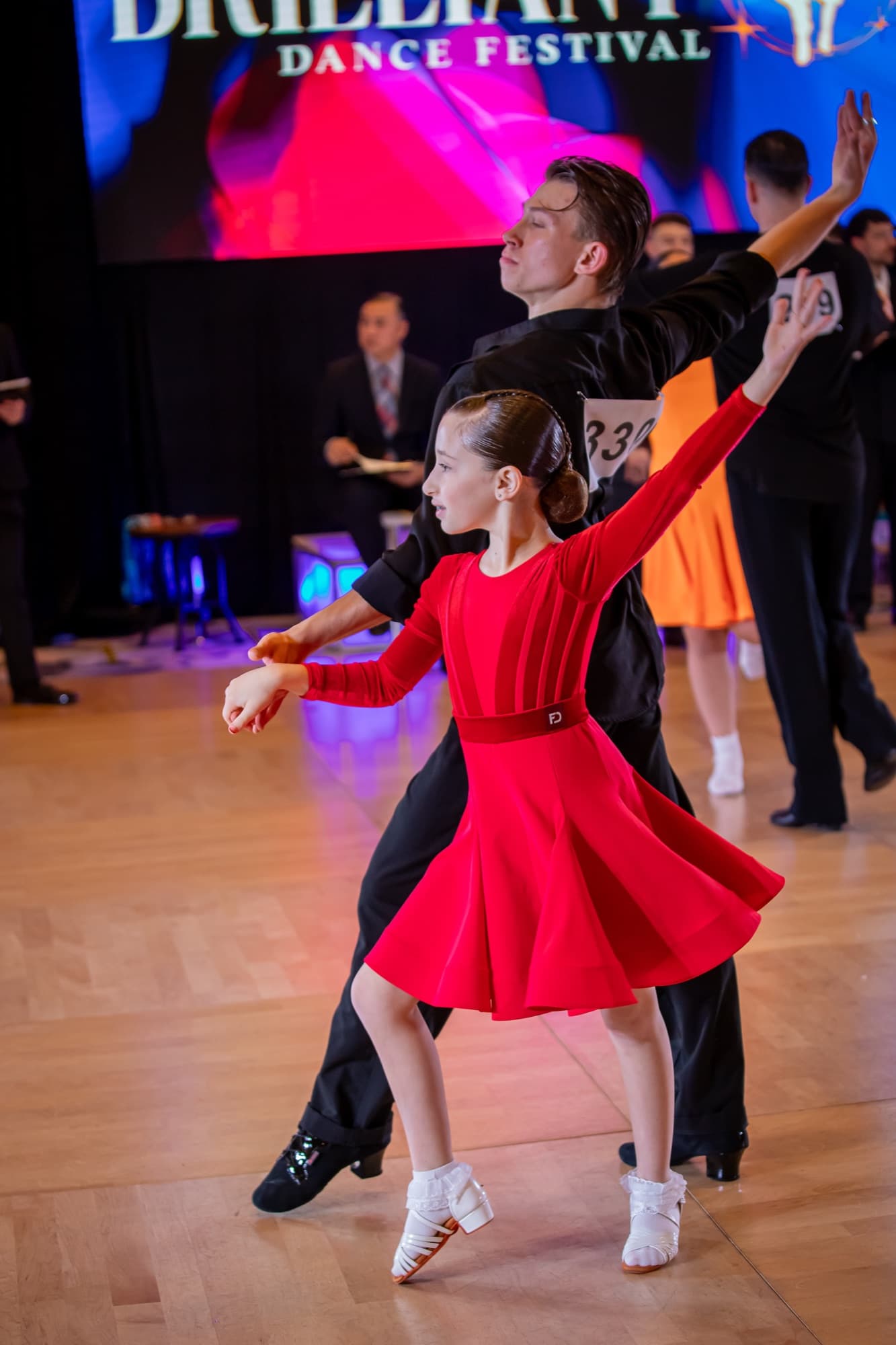 Junior Latin dancers competing at the Brilliant Dance Festival