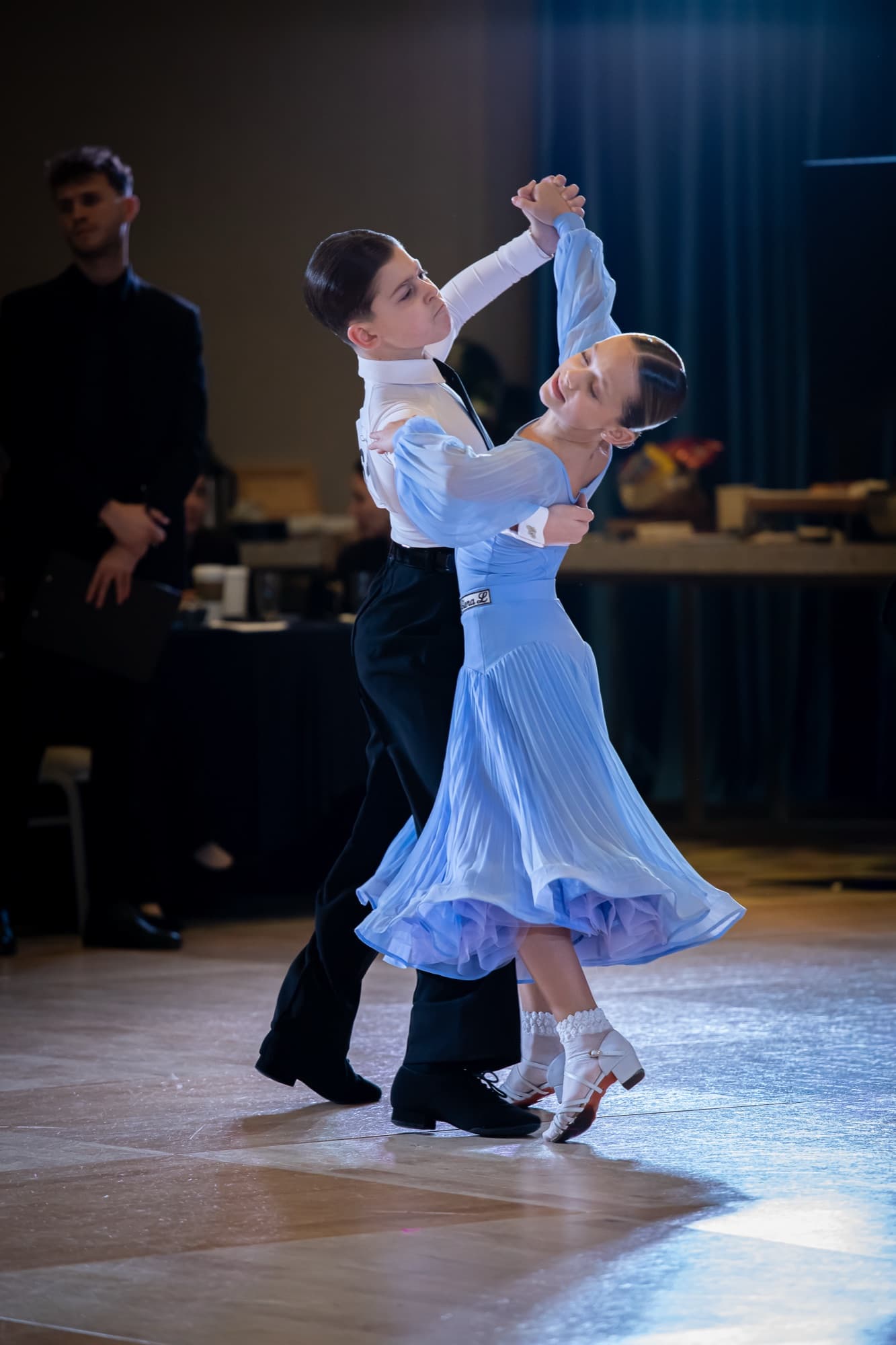 Junior Standard couple dancing in light blue