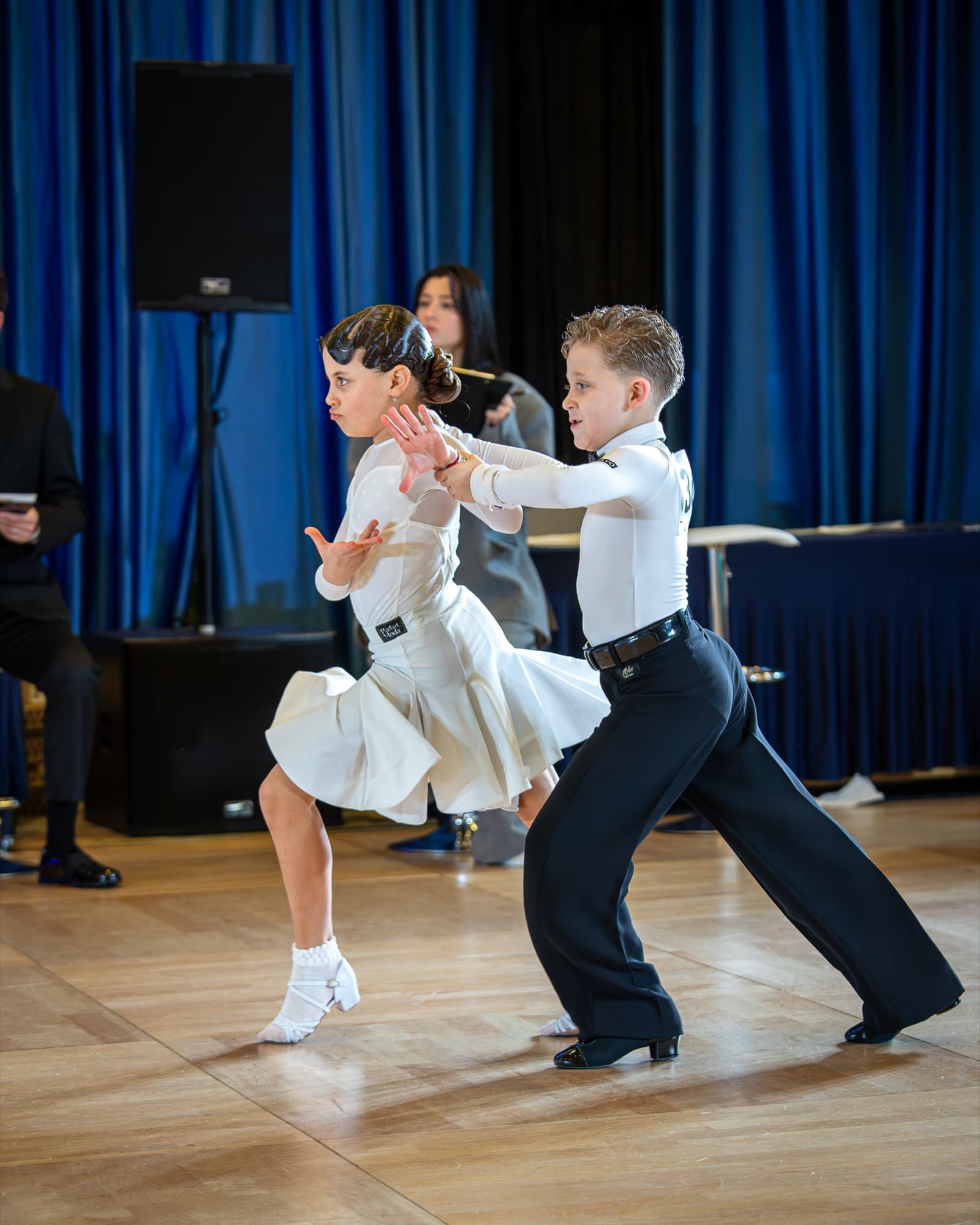 Junior Standard couple in white competition wear